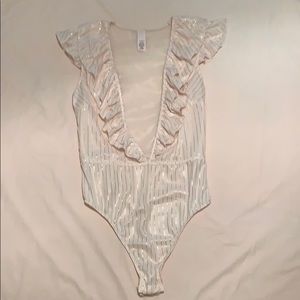 Blush gold pin strip VS bodysuit.